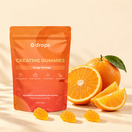 Drops Tangy Orange creatine gummies pouch with oranges and three gummies.